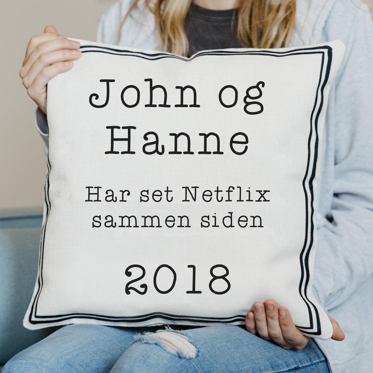 Pudebetræk med ramme og tekst