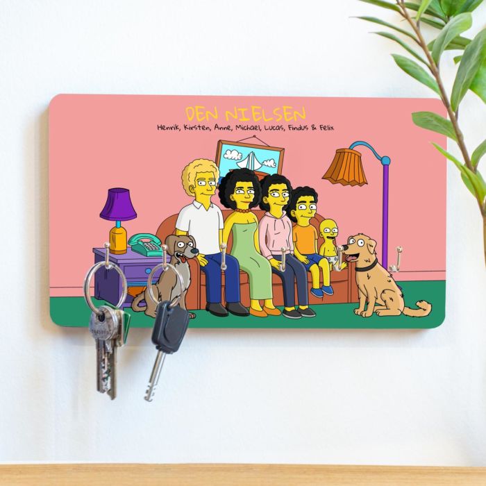 Personaliserbar illustration af cartoon-familie på nøglebræt