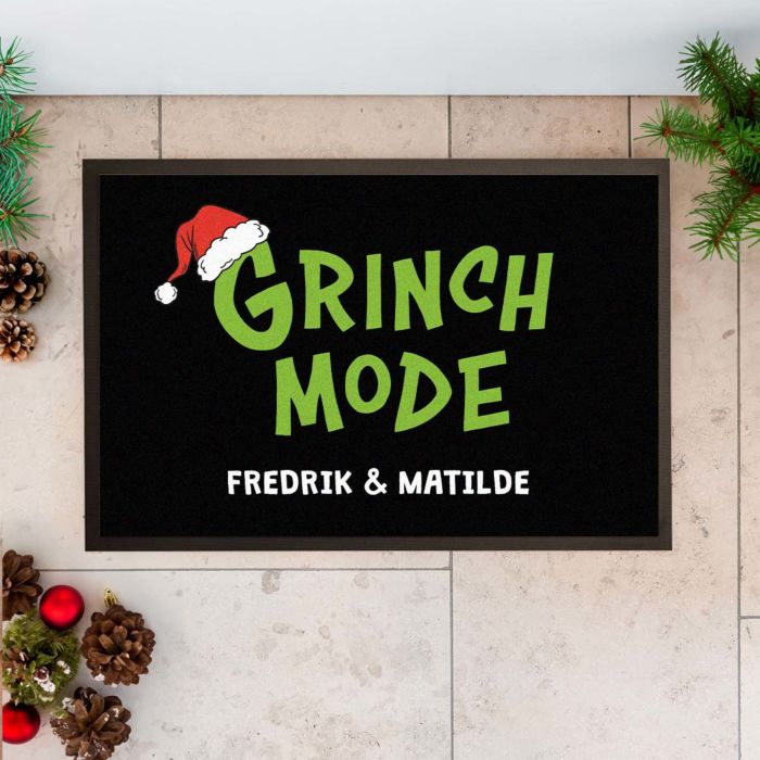 Personlig dørmåtte i Grinch-stil