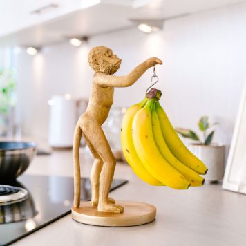 Bananholder med guld abe